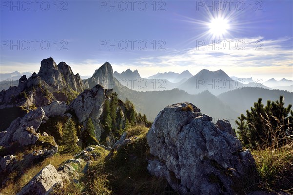 Sun star over Fribourg Pre-Alps