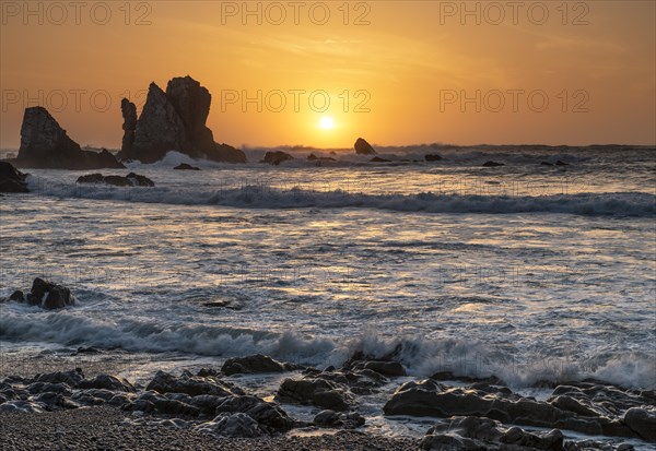 Sunset on the beach Playa del Silencio