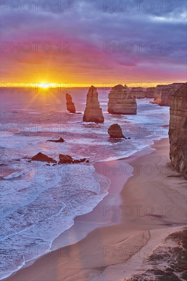 Rocky coast with the Twelve Apostles at sunset
