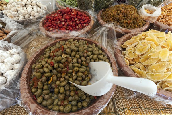 Antipasti and candied fruits at a market stall in Cannobio