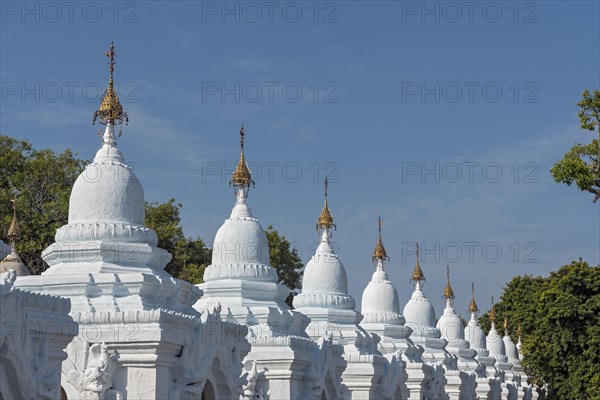 White kyauk gu cave stupas at Kuthodaw Pagoda