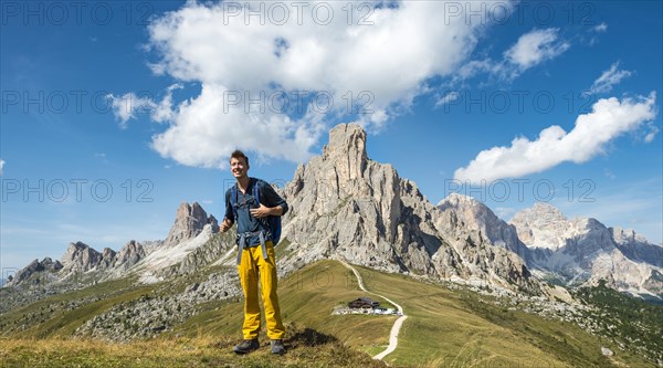 Hiker above Passo Giau