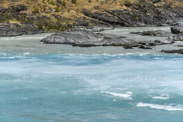 Confluence of turquoise Rio Baker and glacier gray Rio Nef