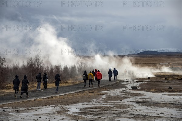 Tourists at the Haukadalur geothermal field