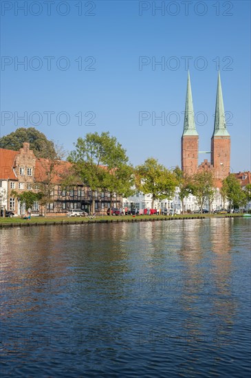 Historical townscape on the river Trave with cathedral