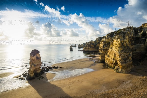 Coloured cliffs and sunrise at the beach