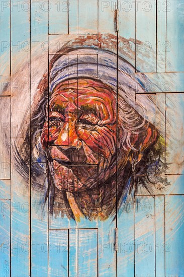 Door painting representing an old Nepalese Man