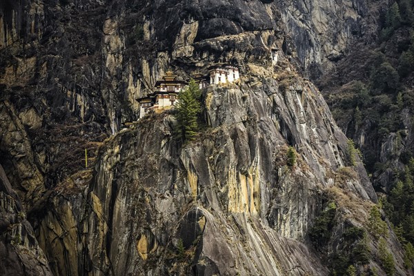 Buddhist tiger nest monastery Taktshang on steep rock face