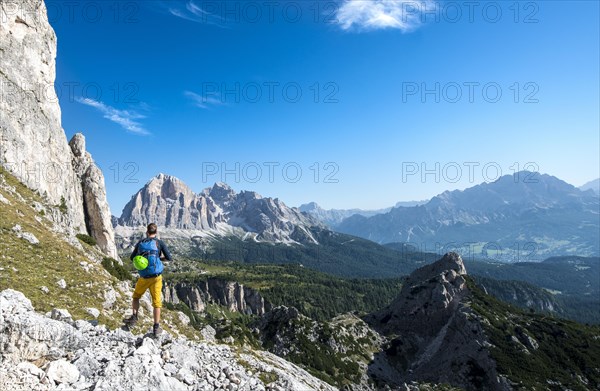 Hiker on footpath to the Nuvolau