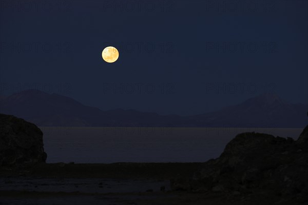 Full moon setting at dawn