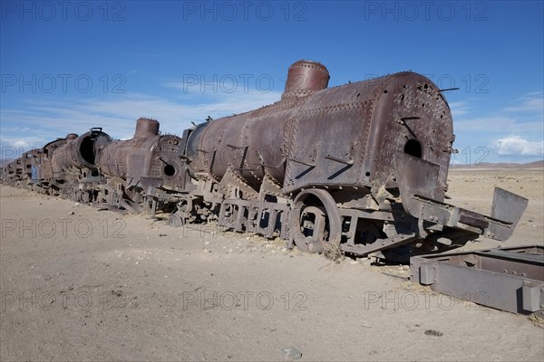 Train with steam locomotive at the railway cemetery