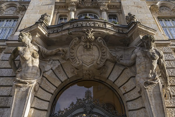 Two atlases at the entrance portal of the former building of the Bayerische Hypotheken- und Wechselbank