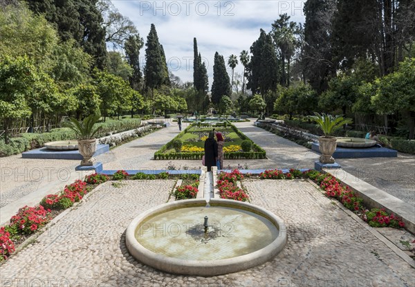 City park with fountain and flowers