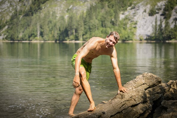 Young man with bathing trunks