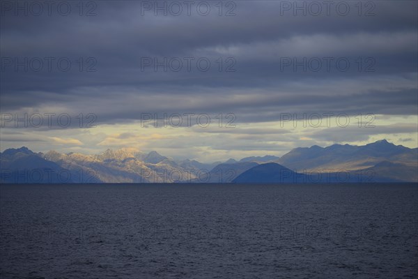 Coastal landscape with dark clouds