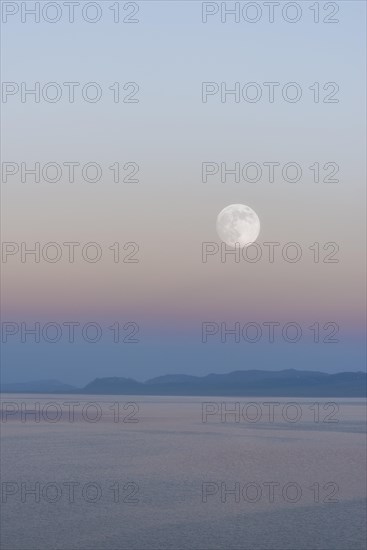 Moon rising over Song Kol lake