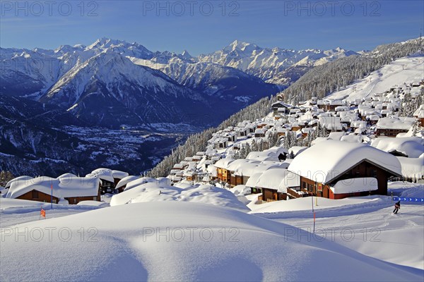 View of the village overlooking the Rhone valley with deep snowfall