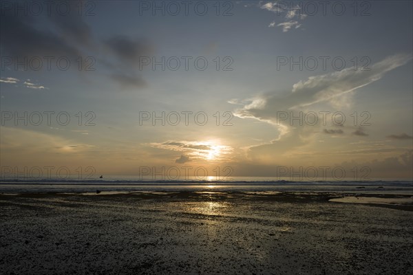 Littoral zone at low tide at sunset