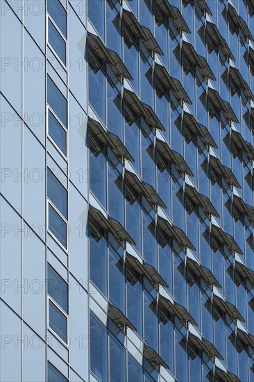 Ventilation flaps on windows in skyscraper facade