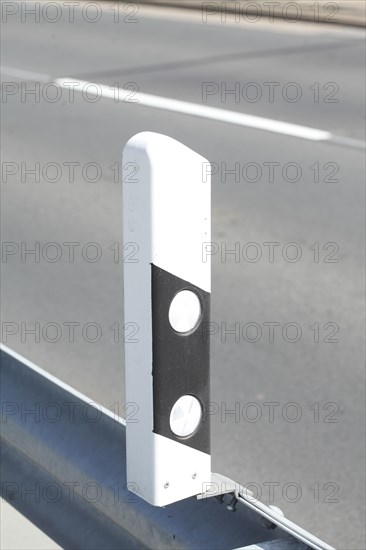 Road bounding post at guard rail