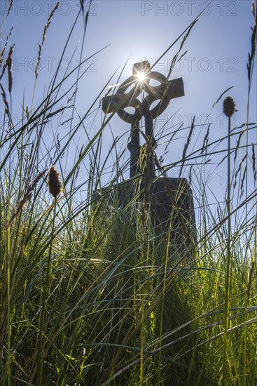 Celtic cross in the high grass