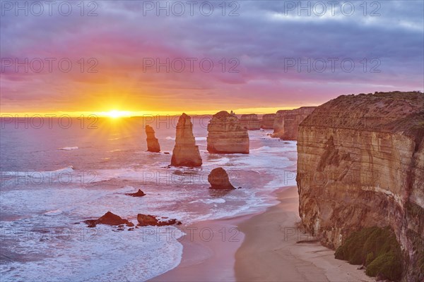 Rocky coast with the Twelve Apostles at sunset