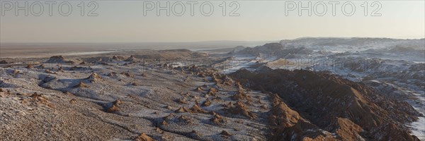 Bizarre red rock formations with white salt