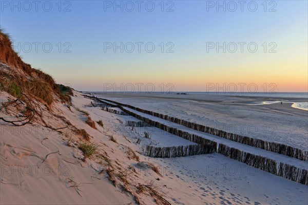 High dunes at Norddorf with sand fences on the beach