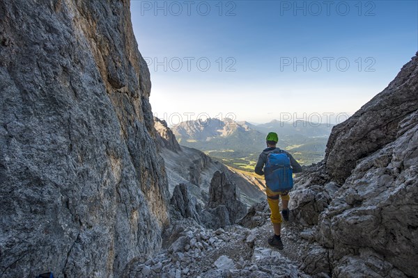 Hiker in the Santner via ferrata