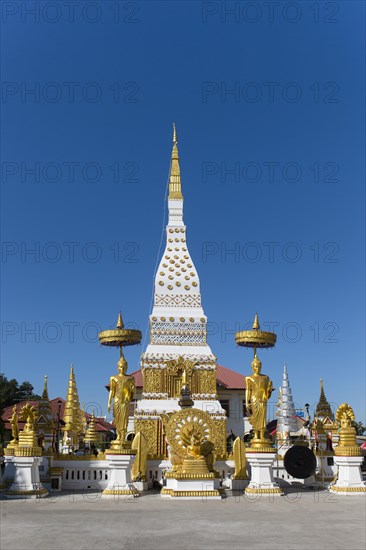 Chedi of Wat Mahathat Temple with Wheel of Life and golden Buddha figures