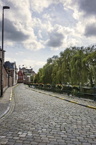 Road along the river Leie with a view of Gravensteen