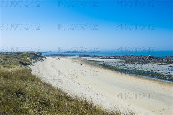 Overlook over a sand beach at the north coast of Herm