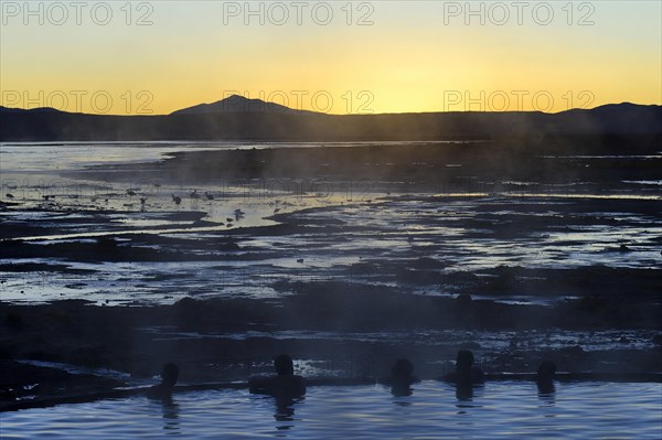 Bathers in the hot spring Termas de Polques at the Salar de Chalviri