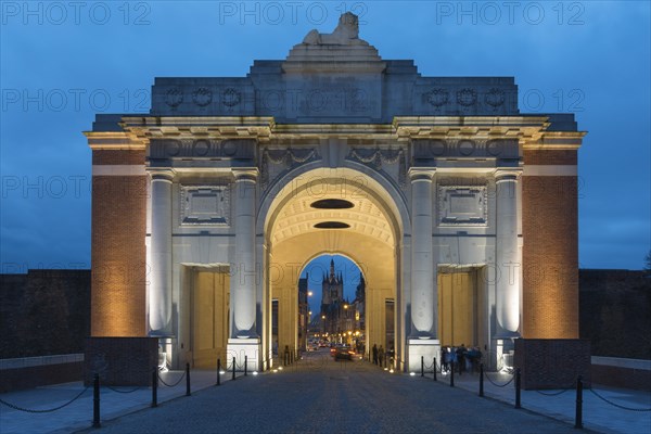 Illuminated Menin Gate at dawn