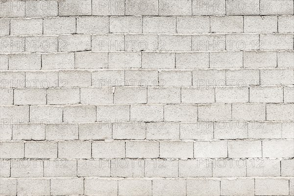 Brick-built wall of gray expanded clay stones