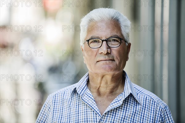 Grey-haired Senior with glasses
