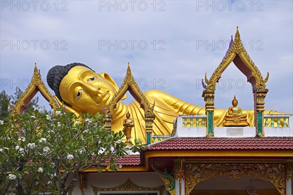 Lying golden Buddha in the temple Wat Sri Sunthon