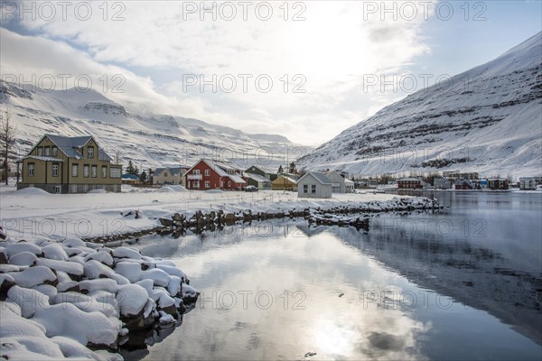 View over the village Seyoisfjorour with snow