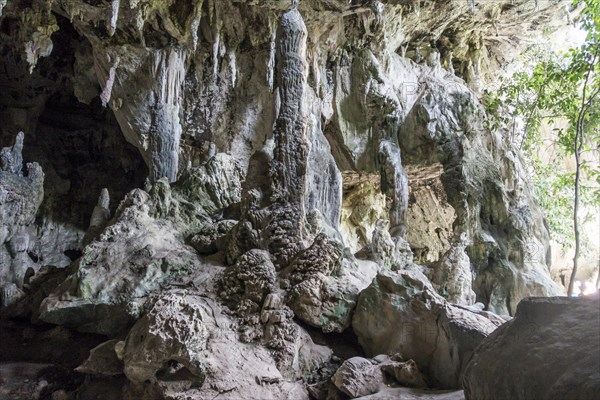 Entrance with stalagmites in dripstone cave