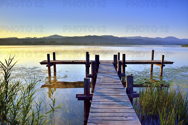Wooden pier in the morning light at Pfaffikersee
