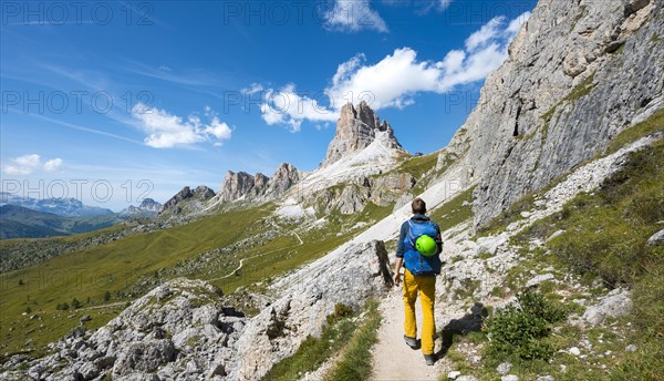Hiker on the circular hiking trail from Passo Giau via Nuvolau