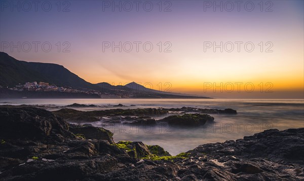 Rocky coast and sea at sunset