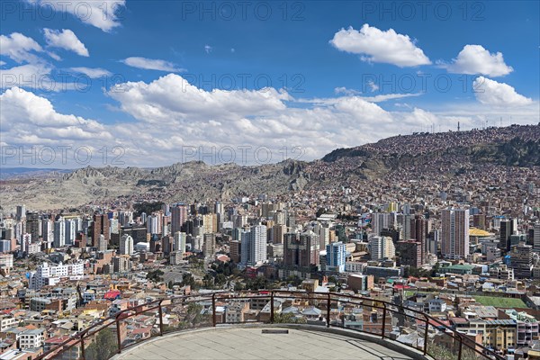 View of the city with skyscrapers in front of the mountains