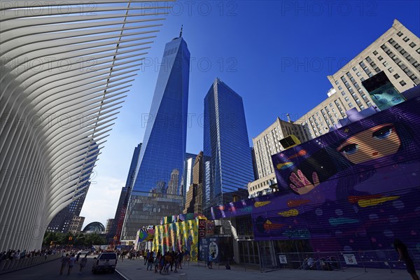 Construction site with graffiti decorated walls in front of the Oculus