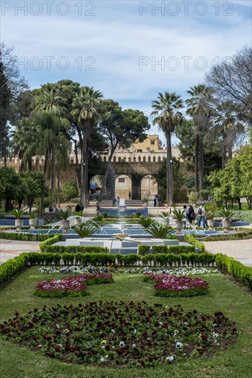 City park with fountain and flowers