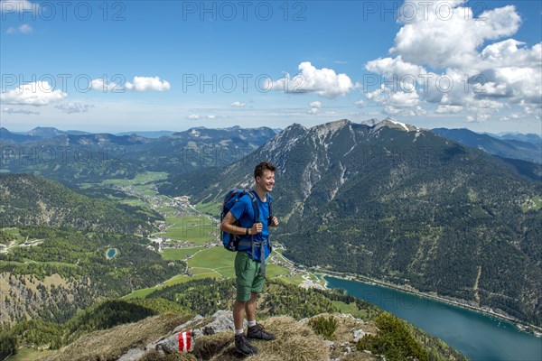 Hiker on the summit of the Seekarspitz