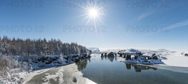 View of volcanic rock formation in the water