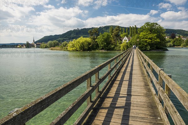 Wooden bridge crossing the Rhine River to the monastery island of Werd