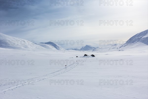 Track with markings in winter in front of Salka