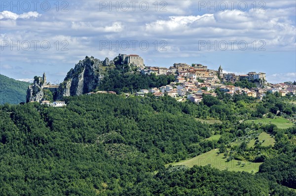 View of mountain village Bagnoli del Trigno with church Chiesa di San Silvestro and castle ruin Chiesa di San Silvestro